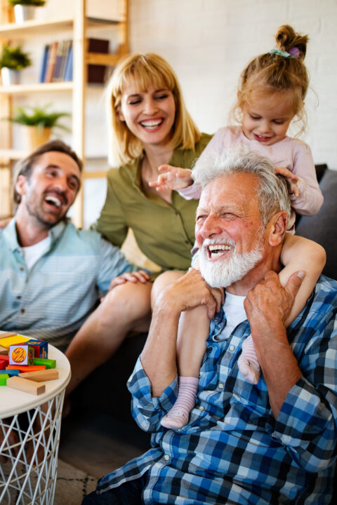 Senior,Grandparents,Playing,With,Grandchildren,And,Having,Fun,With,Family